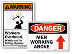 Men Working Above Signs