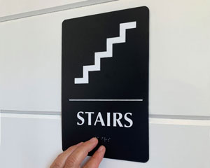Braille stairs sign