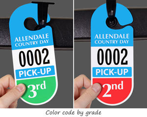 Parent pick-up mirror tag with school’s name