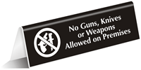 No Guns, Knives Or Weapons Allowed Sign