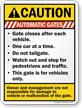 Automatic Gates, Closes After Each Vehicle Caution Sign