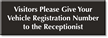 Visitors Give Vehicle Registration Number To Receptionist Sign