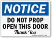 Do Not Prop Open This Door sign