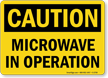 Caution: Microwave In Operation