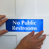 No public restrooms sign on a door