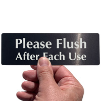 Please flush after each use sign