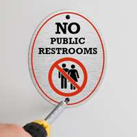 sign indicating public restrooms