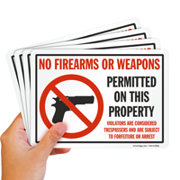 No firearms/weapons permitted sign