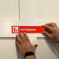 Fire Extinguisher Sign on a Door