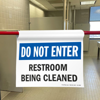 Safety barricade sign for restroom maintenance