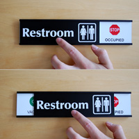 Vacant or occupied women’s room sign