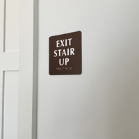 Braille exit stair up sign
