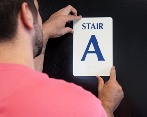 Braille stairs sign