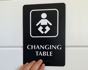 Baby changing facilities toilet sign 