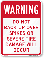 Warning Do Not Back Up Over Spikes Sign
