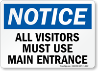 Visitors Use Main Entrance Sign