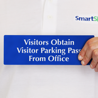 Visitors Obtain Parking Pass From Office Sign