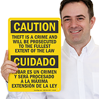 Caution Theft Prosecuted Bilingual Sign