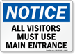 Visitors Use Main Entrance Sign