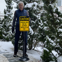 Slippery icy parking lot warning sign