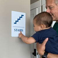 Stairs sign with braille