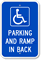 Parking And Ramp In Back With Graphic Sign