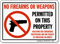 No Firearms Weapons Permitted Sign